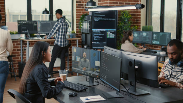 istock Software company employee in video call conference with business owner discussing coding project deadline 1448506039