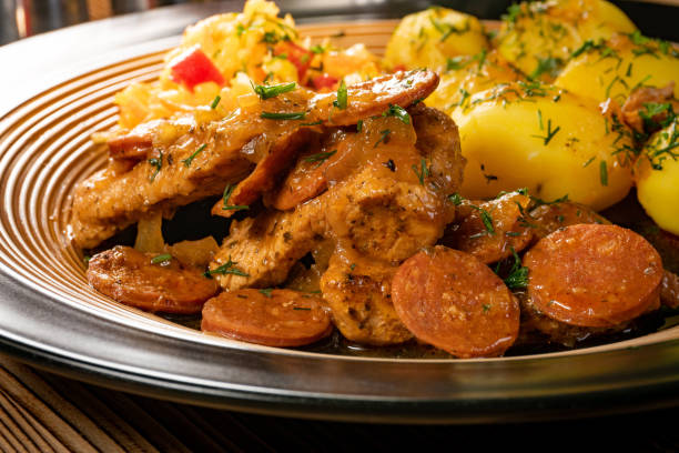 istock Stewed turkey meat with chorizo sausage. 1448506127