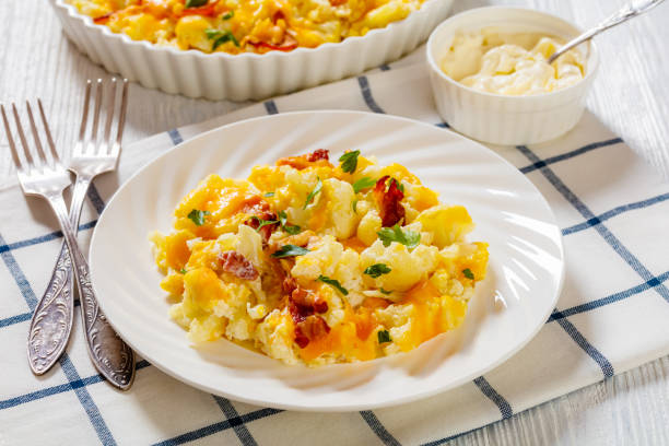 istock cauliflower bacon cheese casserole on white plate 1448506162