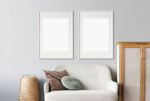 istock Two blank picture frames on a wall. Artwork mockups in interior design. Vertical orientation. 1448509539