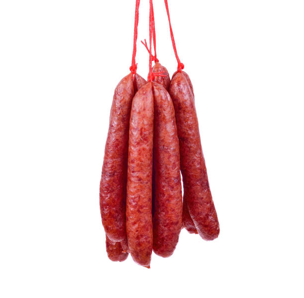 istock Dried pork sausages isolated on white background 1448510683