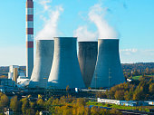 A power plant with huge chimneys, a view from the drone, from the air.