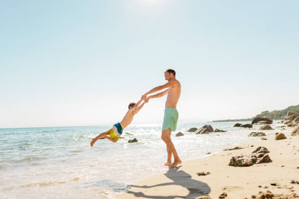 istock Precious moments with dad at the beach 1448512085