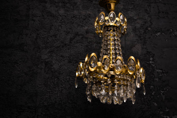 istock vintage golden chandelier on a dark background 1448512408