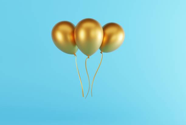 istock Gold balloons on a light background. 1448512419