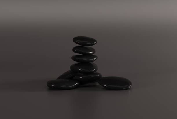 istock Black massage stones on a dark background. 1448512538