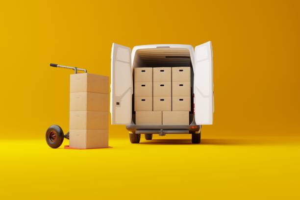 istock Commercial delivery white van with cardboard boxes on yellow background. 1448513219