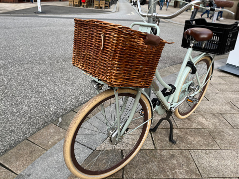 Bicycle with baskets parked on Hamburg street
