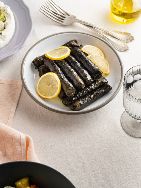 Stuffed vegetables with olive oil, Stuffed grape leaves, Delicious turkish meal dolma stock photo