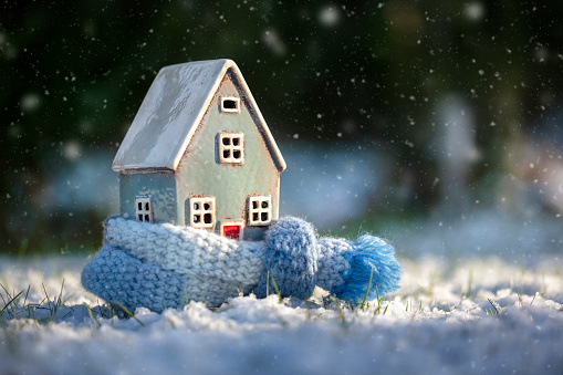 House and home winter heating and insulation background fuel and energy crisis concept