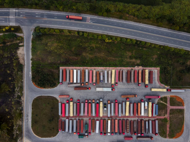 istock Aerial view of container car waiting area and road 1448514321
