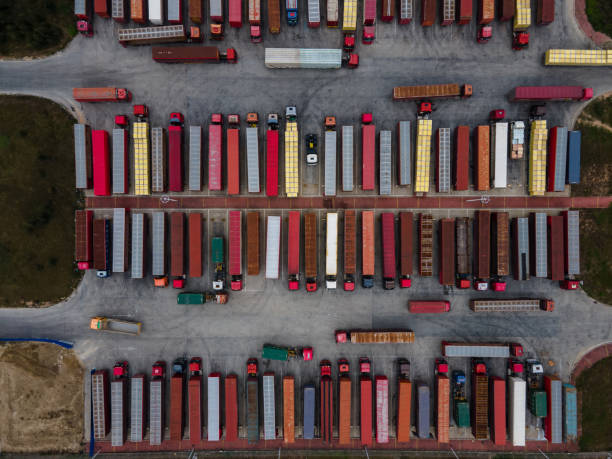 istock Aerial view of container car waiting area 1448514325