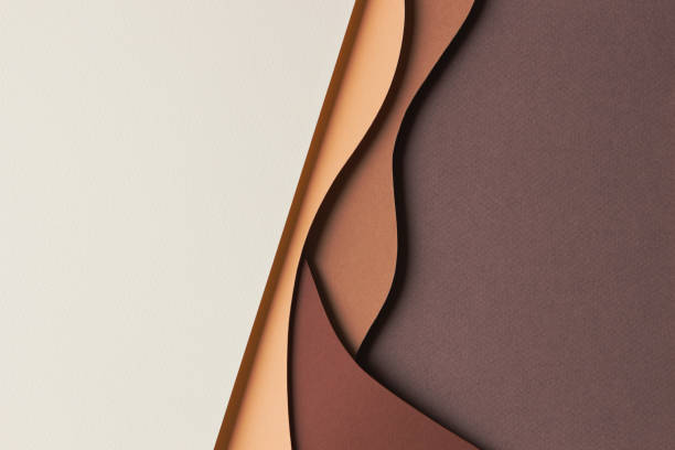 istock Abstract colored paper texture background. Minimal paper cut style composition with layers of geometric shapes and lines in shades of beige and brown colors. Top view 1448516044