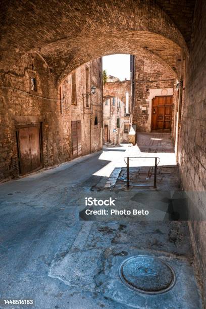 A Beautiful Stone Arched Alleyway In The Medieval Heart Of Perugia In Umbria In Central Italy Stock Photo - Download Image Now