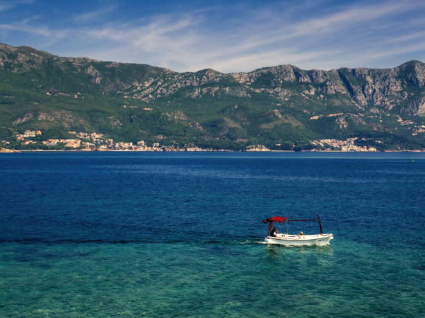 Boat floating on the water in Budva, Montenegro