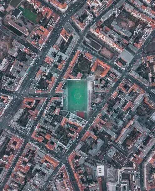 Soccerfield Football Field in Urban City Residential Neighborhood of Berlin, Germany, Aerial Birds Eye Overhead Top Down View HQ