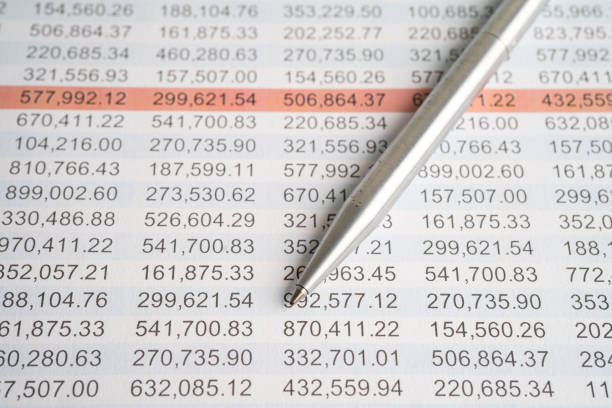 Spreadsheet table paper with pen. Finance development, Banking Account, Statistics Investment Analytic research data economy, trading, office reporting Business company concept.