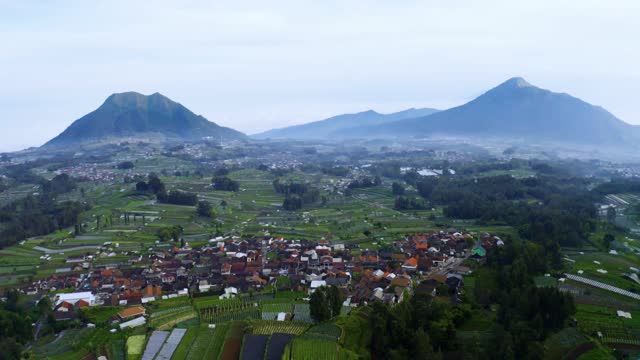Village with misty Andong and Telomoyo mountain