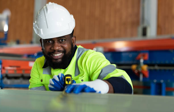 istock Young engineers engineers testing and confirming that the machinery at the factory 1448529531