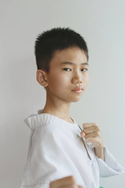 istock A Confident Taekwondo  Asian Kid Portraits 1448530494