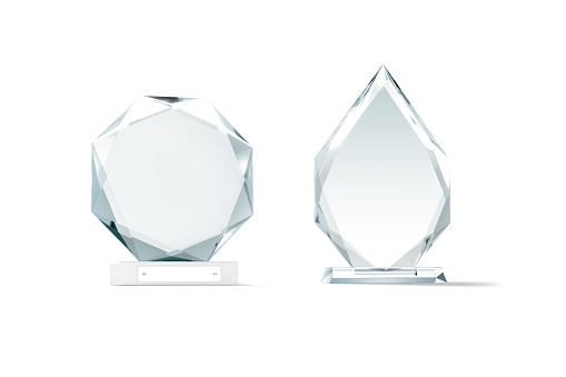 Blank glass arrow and round shape award mockup, isolated, 3d rendering. Empty acrylic trophy achievement for winner mock up, front view. Clear transparent plexi stand grand awards template.