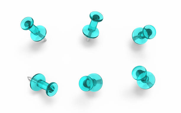 istock Turquoise Transparent Push Pins on White Background Clipping path 1448540595
