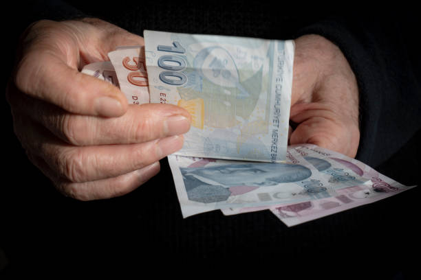 istock Man Giving Turkish Currency 1448542303