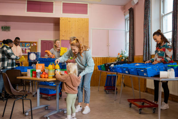 istock Helping Mummy at a Food Bank 1448546659