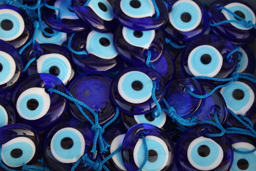 Realistic human eyeball with blue iris on white background