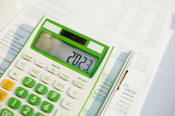 istock tax time. calculator and documents on table 1448550798