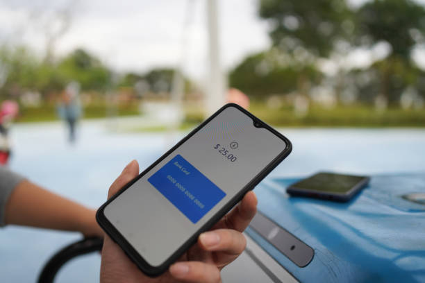 istock Contactless payment with smartphone 1448557309