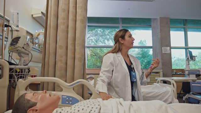Medical students learn patient care by watching experienced doctor