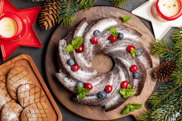 istock Christmas cake with blueberries, cranberries and mint 1448564424