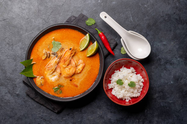 istock Thai Tom Yum Soup and bowl of rice 1448564577