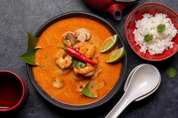 istock Thai Tom Yum Soup and bowl of rice 1448564647