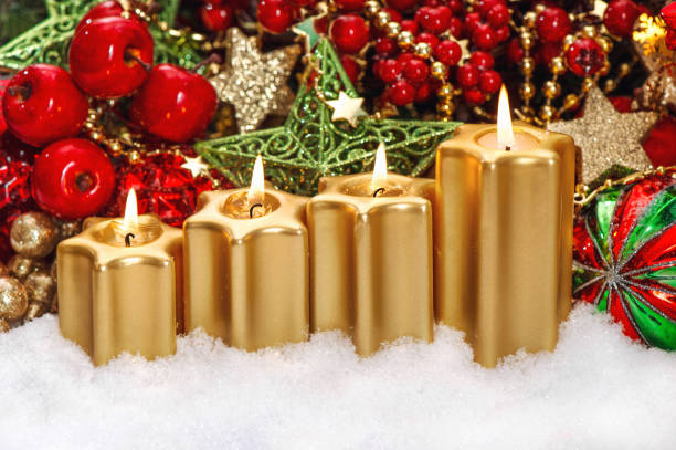 istock Four burning candles red ornaments Christmas advent decoration 1448566758