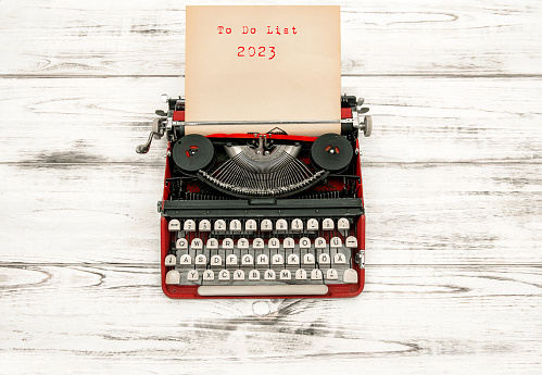 New Years Resolutions. Vintage typewriter with text To Do List 2023