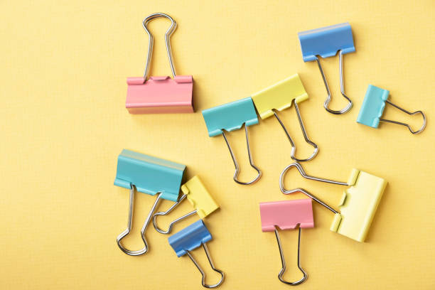 istock Color clips for documents on a colored background, a place for information. Close-up. 1448569631