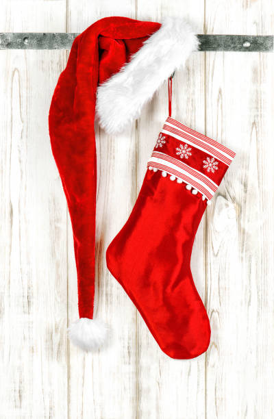 istock Christmas decoration red sock Santa hat. Christmas stocking 1448570968