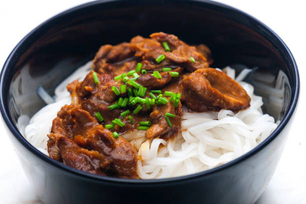 istock meat with sauce served with rice noodles 1448571032