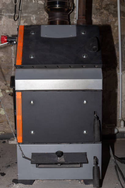 istock heating solid fuel boiler with draft regulator for heating the house with coal and wood 1448571802