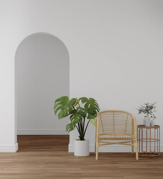 istock Empty white wall with rattan chair and coffee table on wooden floor. 1448573170