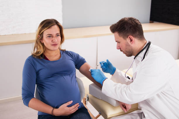 istock Doctor Making Covid 19 Vaccine Injection 1448574005