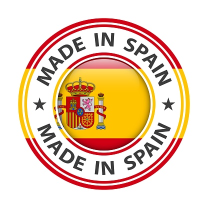 Made in Spain badge vector. Sticker with stars and national flag. Sign isolated on white background.
