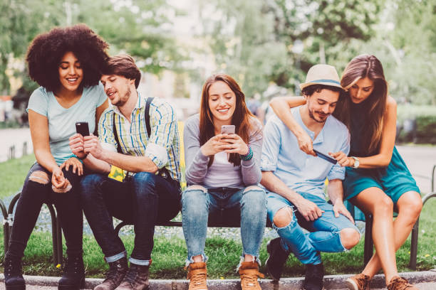 istock Group of Millennials using smartphones 1448580727