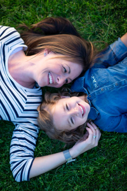 istock Laying in the Grass with Mom 1448581177