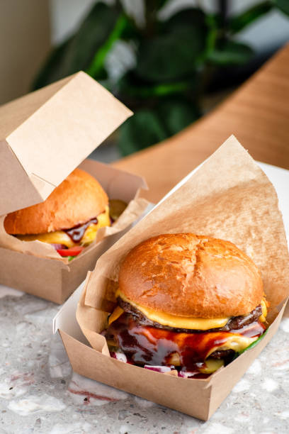 istock Double cheeseburger with a lot of sauces - close up view 1448582788