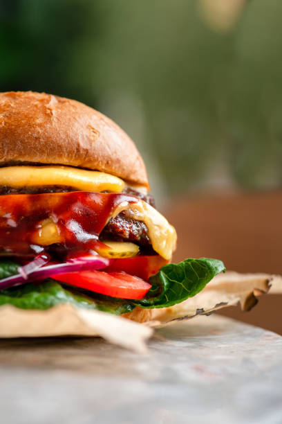 istock Double cheeseburger with a lot of sauces 1448582792