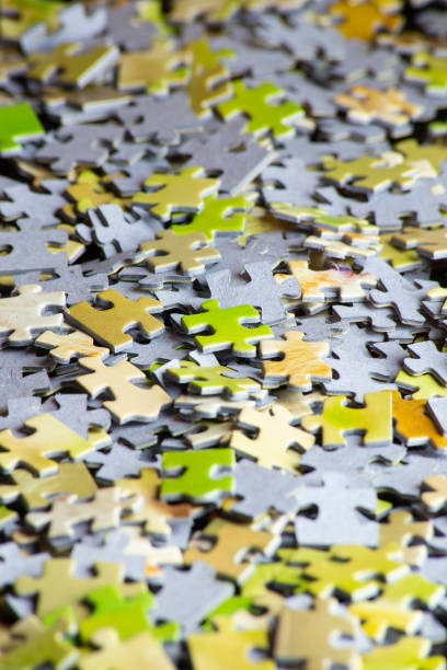 istock background of puzzle pieces in vertical position. selective focus. copy space. resource for social networks. 1448583573