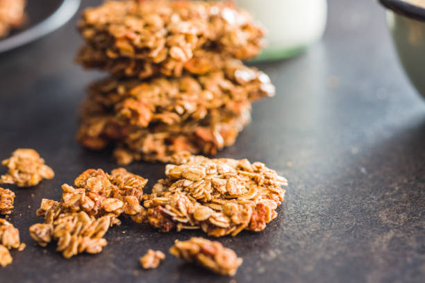 istock Sweet oatmeal cookies on kitchen table. 1448587923